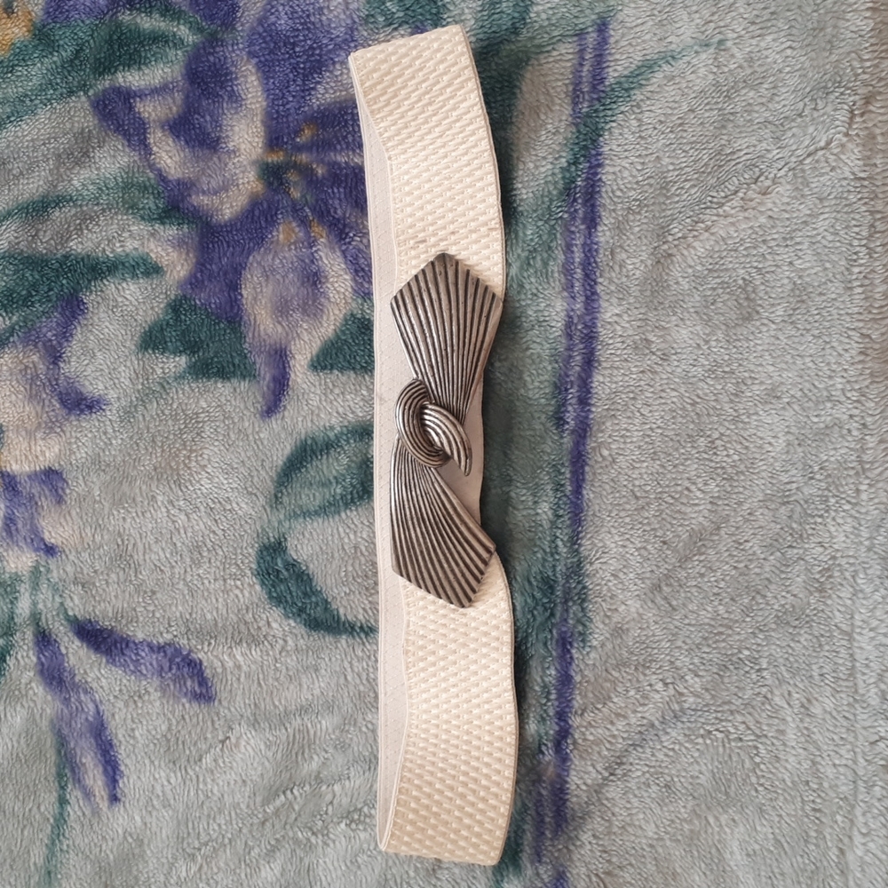 FREE WITH PURCHASE. Local Designer belt, wait 34 inches, white elastic.